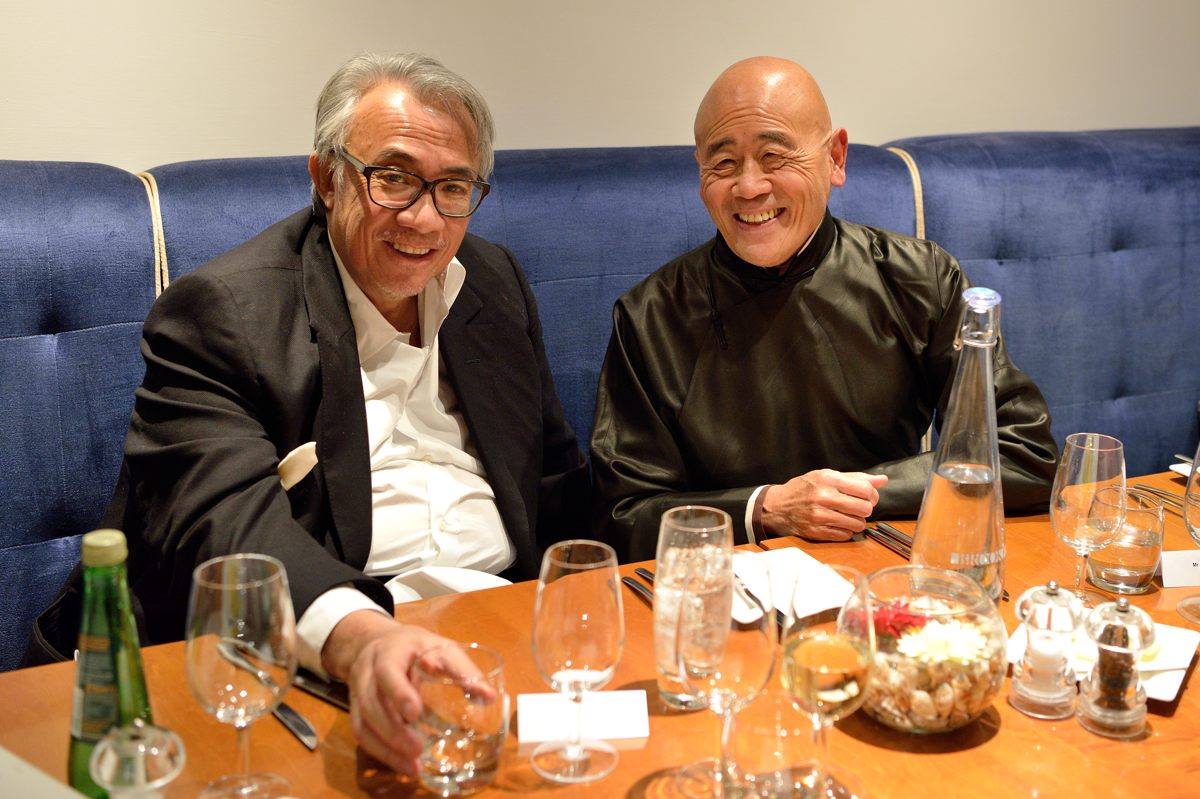 Sir David Tang, entrepreneur and socialite, with chef Ken Hom OBE (2015)— Photo by The Oxford Cultural Collective
