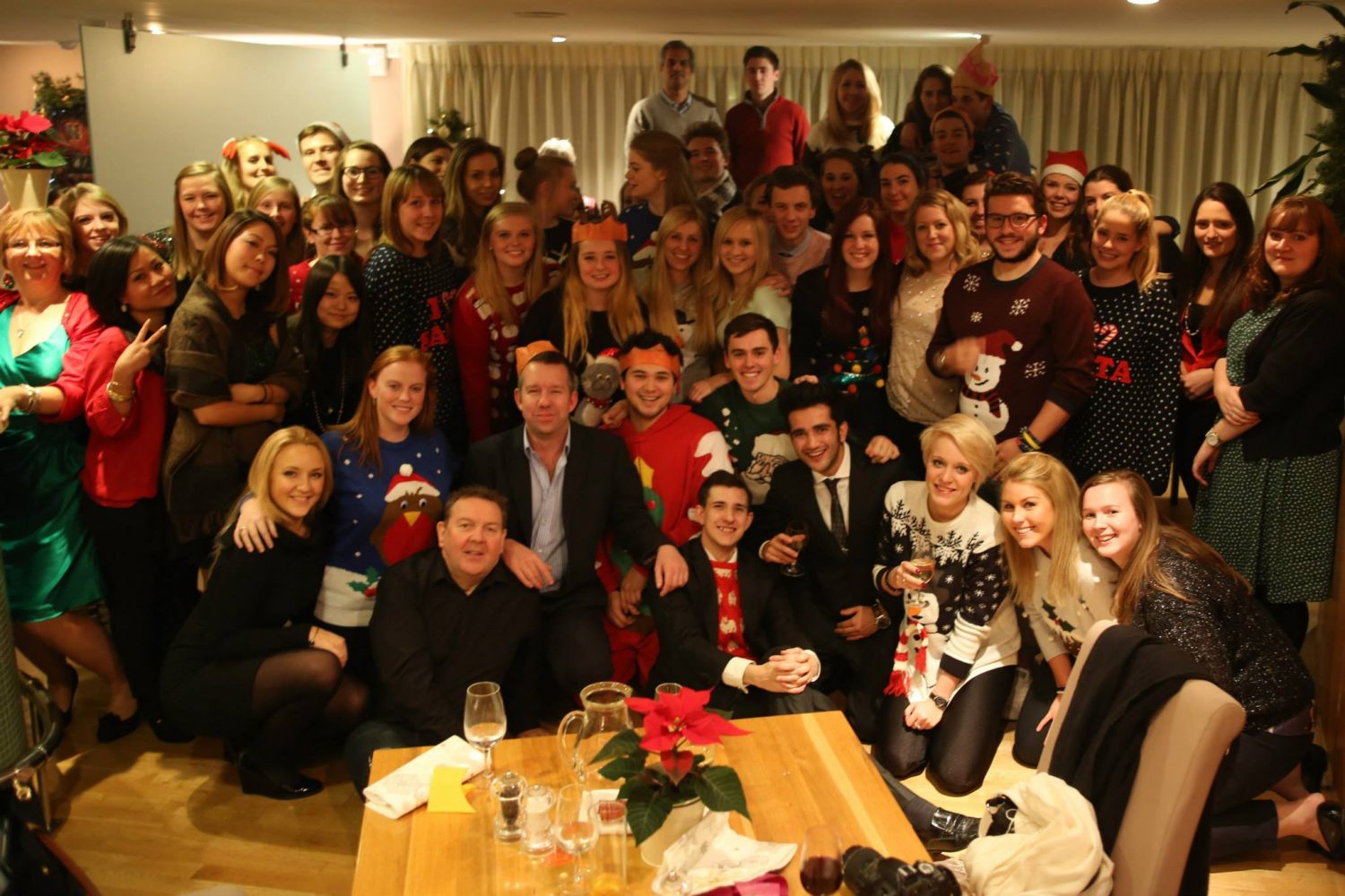 Students and staff enjoying a Christmas party (2013)— Photo by The Oxford Cultural Collective