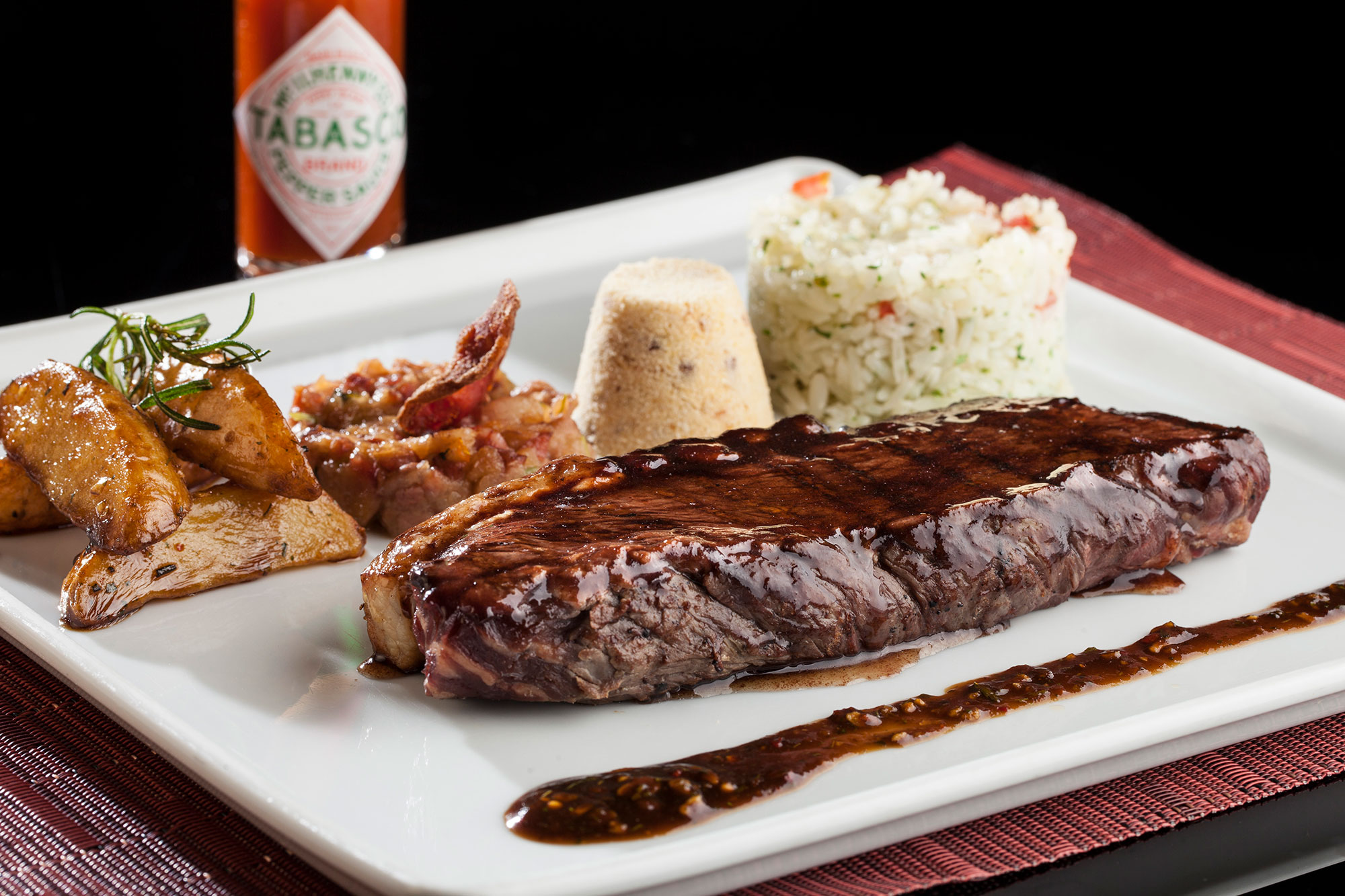 Brazilian style picanha with white rice, french fries and farofa (Source: InterContinental São Paulo) — Photo by IHG
