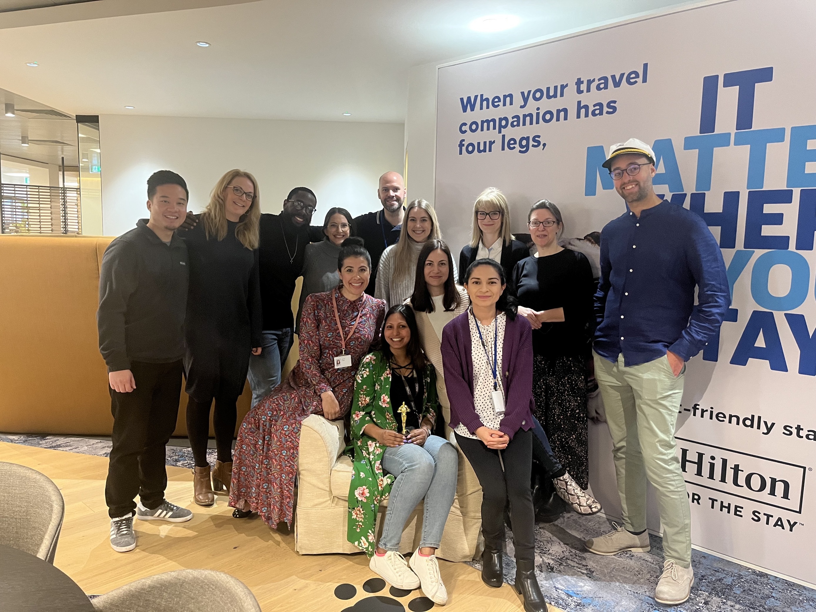 Sreedhevi Raveendran with Hilton team members— Photo by Hilton