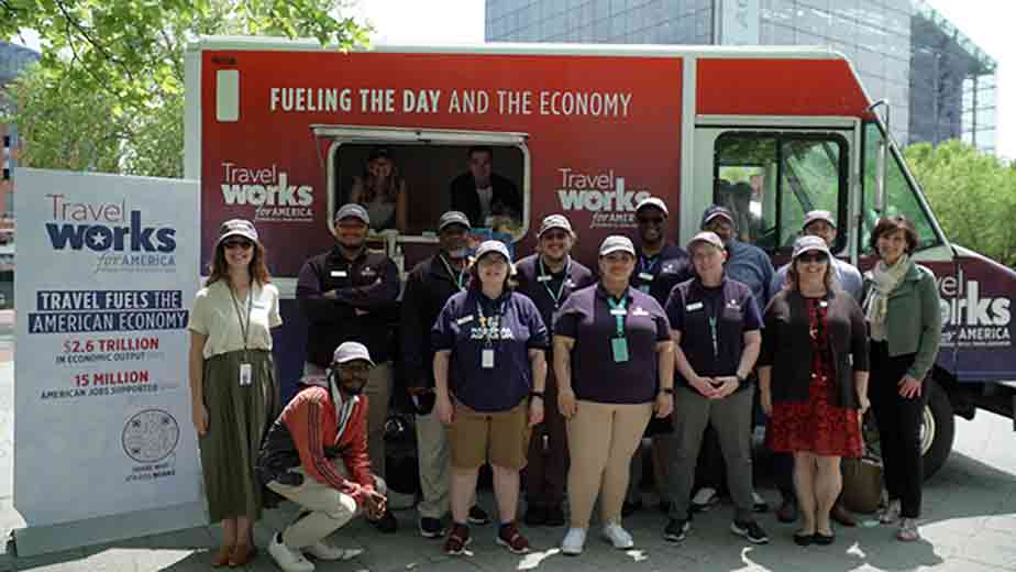 Margot Amelia, Executive Vice President and Chief Strategy Officer, National Aquarium (right), and the National Aquarium team— Photo by U.S. Travel Association