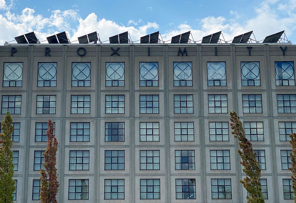 100 solar panels have been installed on the roof of the Proximity Hotel in Greensboro, North Carolina to generate electricity to heat water.— Photo by JLL