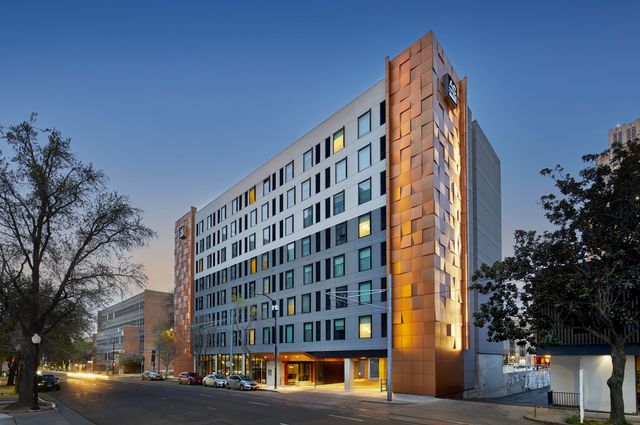 The AC Hotel Sacramento, designed by AXIS Architecture + Design, welcomes guests