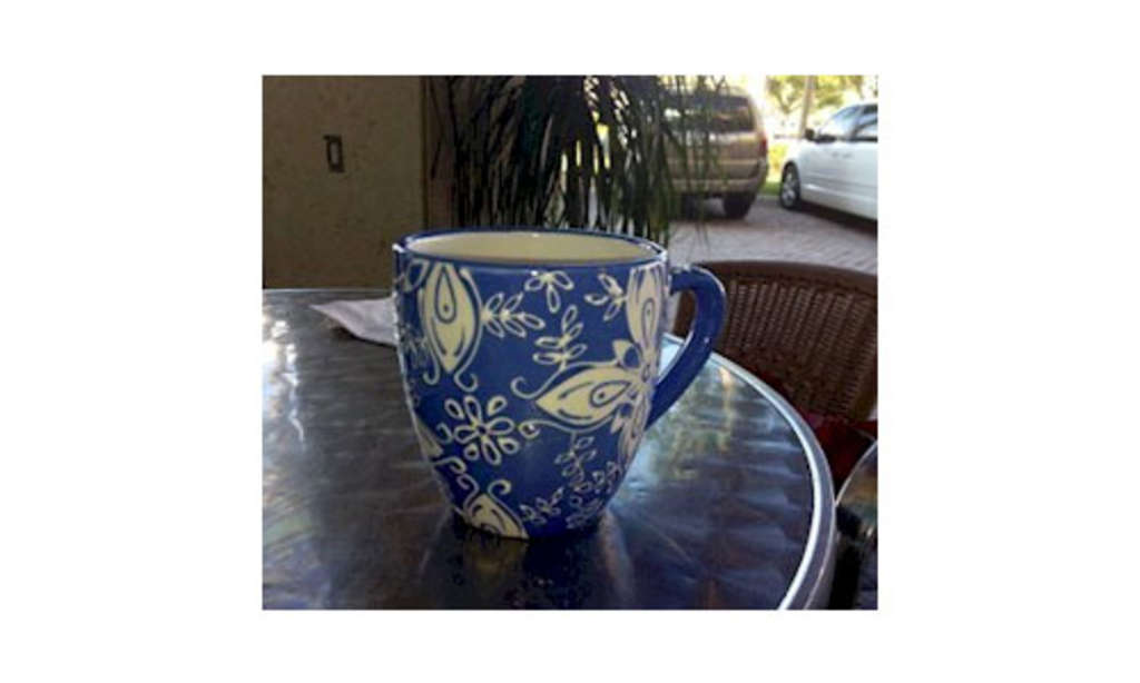 The beautiful blue coffee cup, which enhanced a simple caffe latte— Photo by Hospitality Excellence, Inc.
