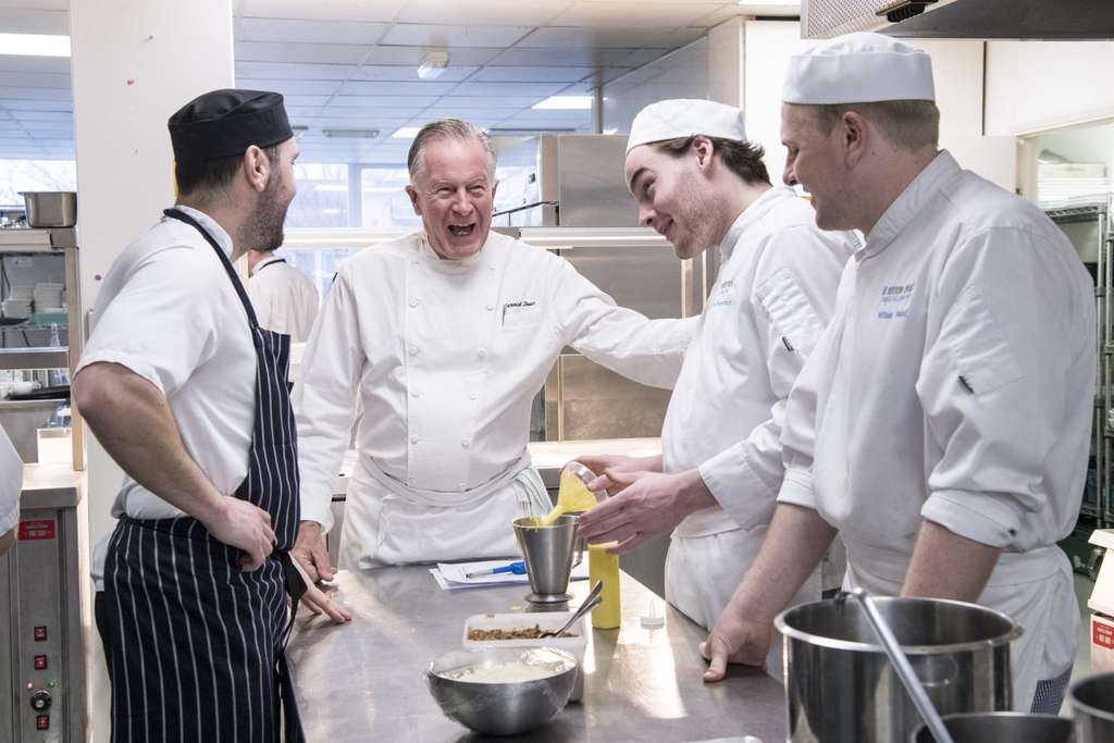 Chef and broadcaster Jeremiah Tower (former owner of Stars and Chez Panisse), with students (2018)— Photo by The Oxford Cultural Collective