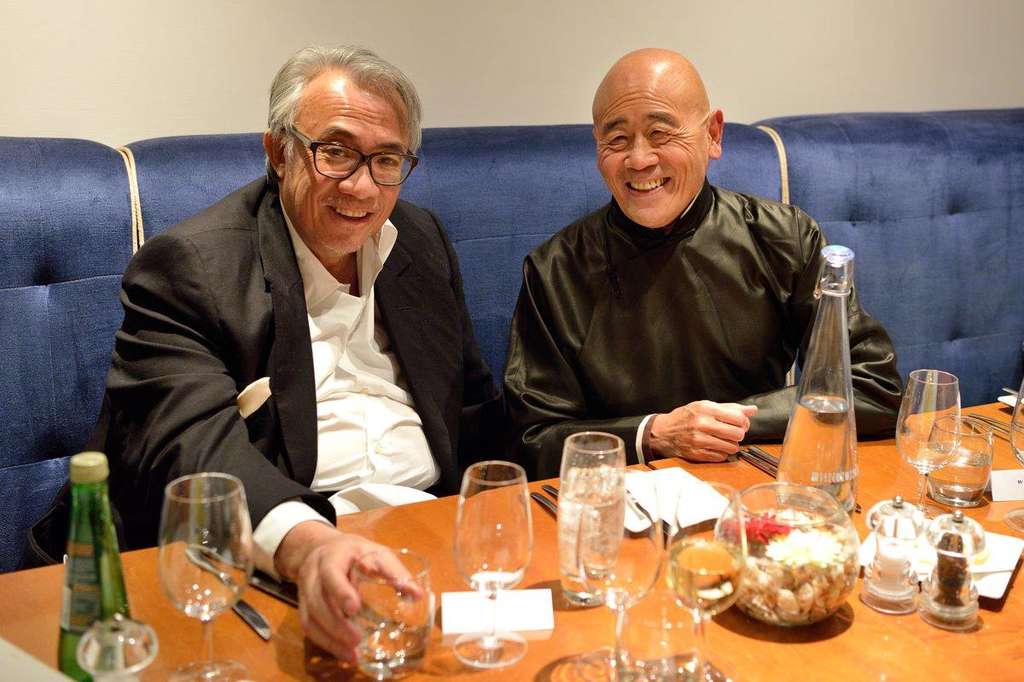 Sir David Tang, entrepreneur and socialite, with chef Ken Hom OBE (2015)— Photo by The Oxford Cultural Collective