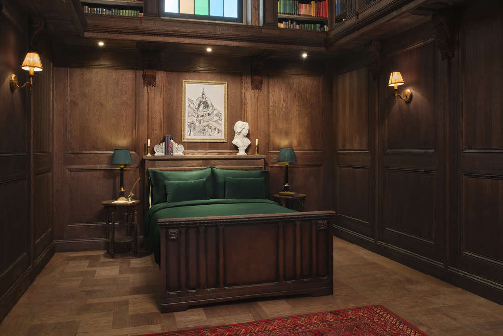 Guests will sleep in the secret heart of this historic landmark and enjoy a night of bookish dreams. — Photo by Airbnb