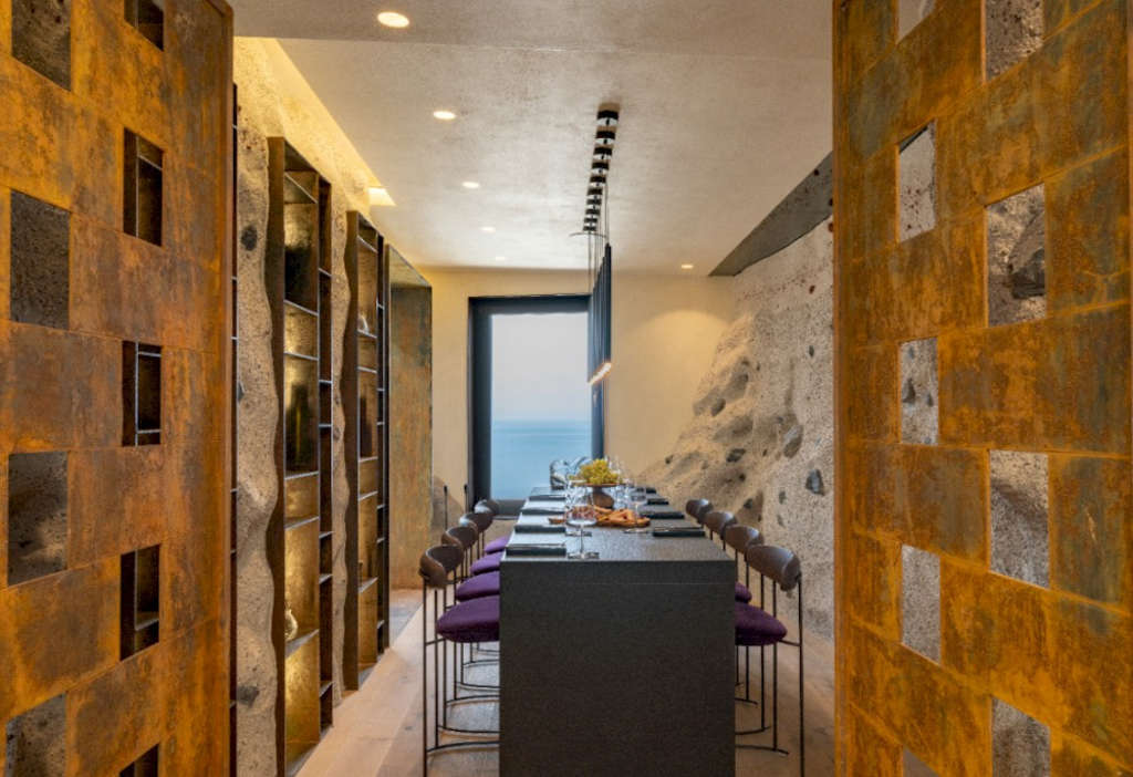 Santo Mine’s private wine cellar, seamlessly integrated into Santorini’s natural landscape — Photo by Metaxa Hospitality Group