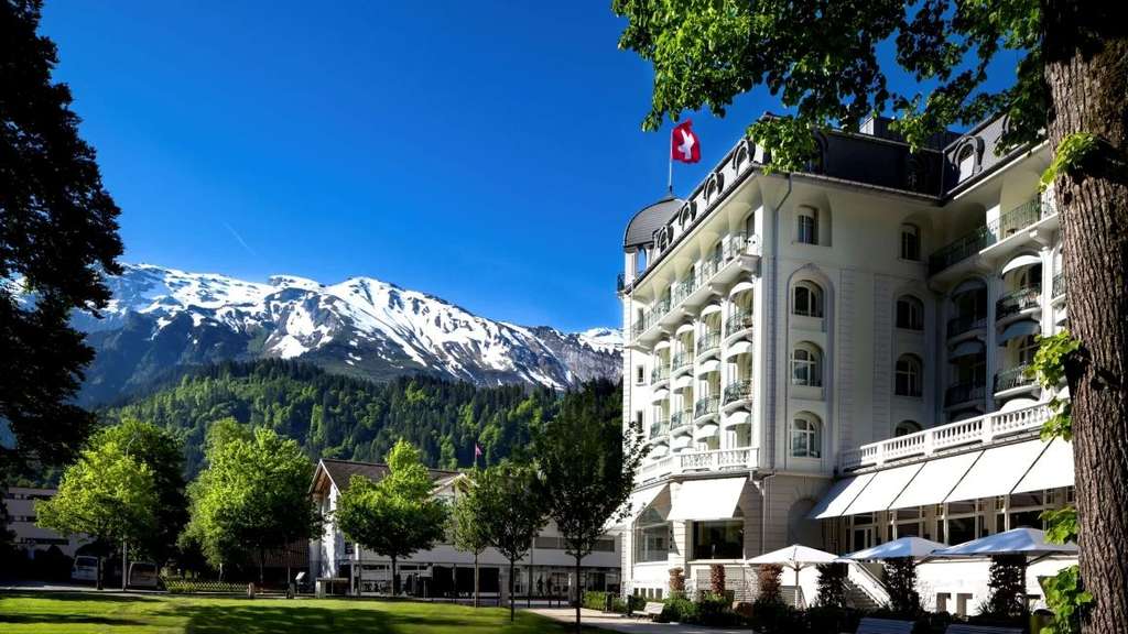 Kempinski Palace Engelberg, set against the breathtaking Swiss Alps, combines timeless European elegance with authentic local charm and modern luxury hospitality. — Photo by Shiji
